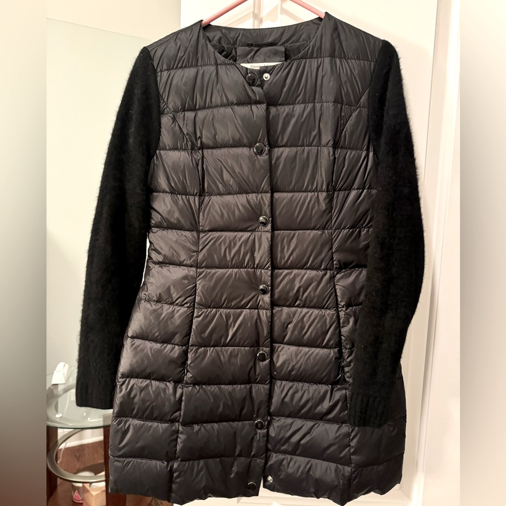 Water-resistant jacket with furry sleeves for warmth